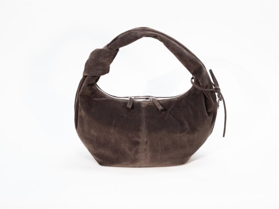 ¿Por qué el bolso Dumpling de ante vintage es una elección de moda popular esta temporada?