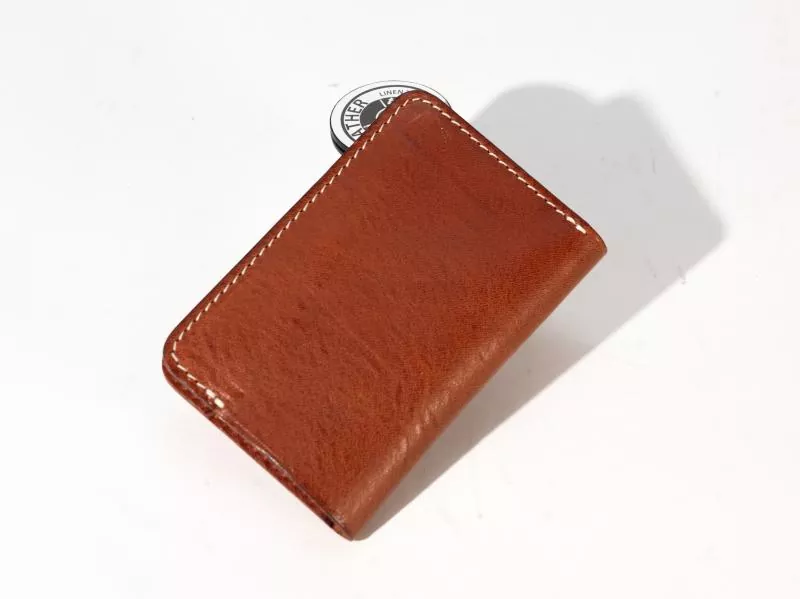 Retro Trend Returns Cartera corta de cuero genuino cosida a mano, la nueva favorita de la ciudad, que combina calidad y practicidad